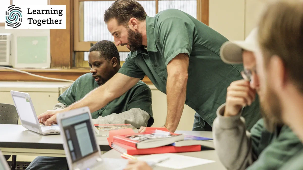 Students collaborating in a prison education program